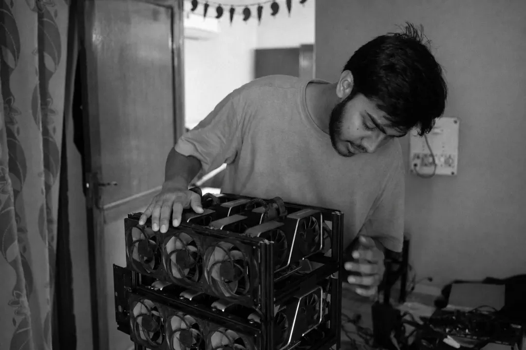 Abhi working on a cryptocurrency mining rig
